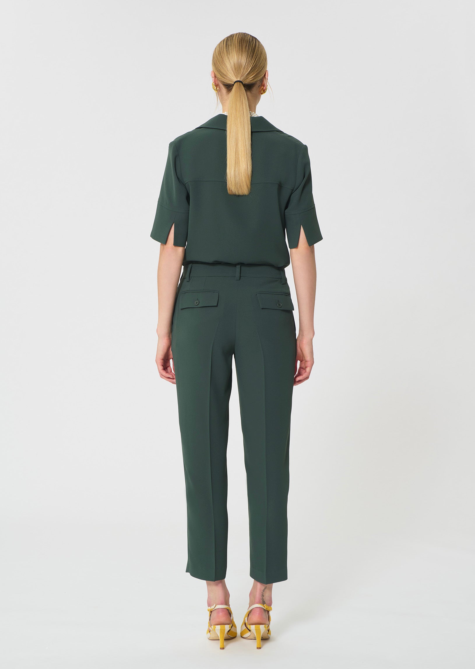 trousers in dark green in fluid crepe