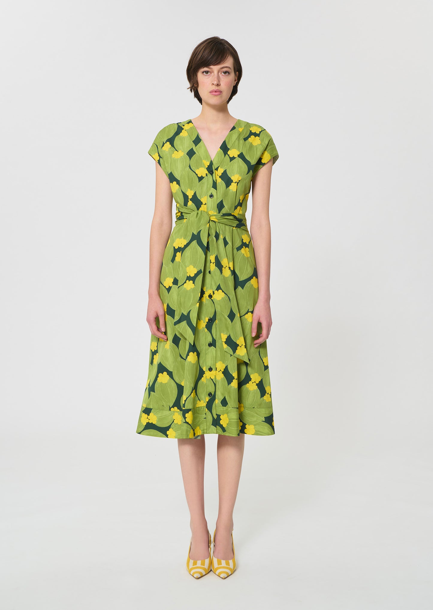 dress in dark green floral print
