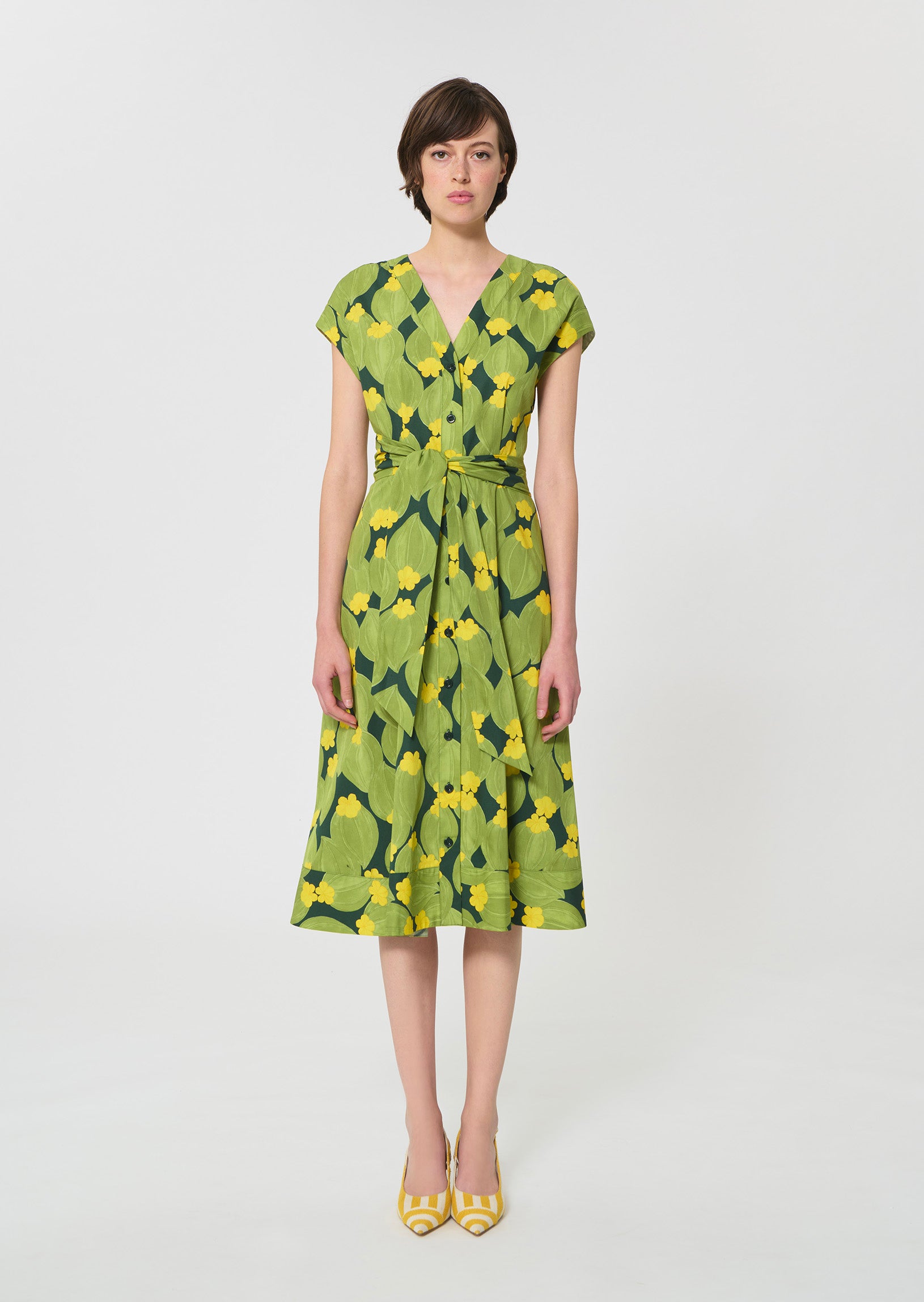 dress in dark green floral print