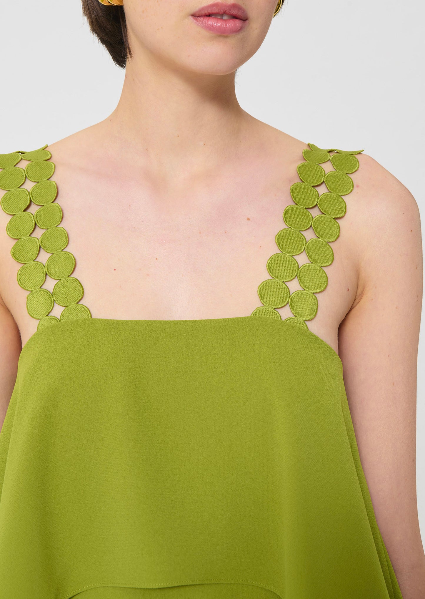 dress in green fluid crepe