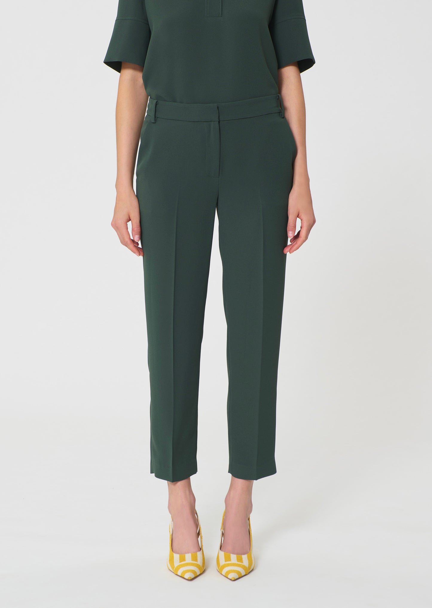 trousers in dark green in fluid crepe