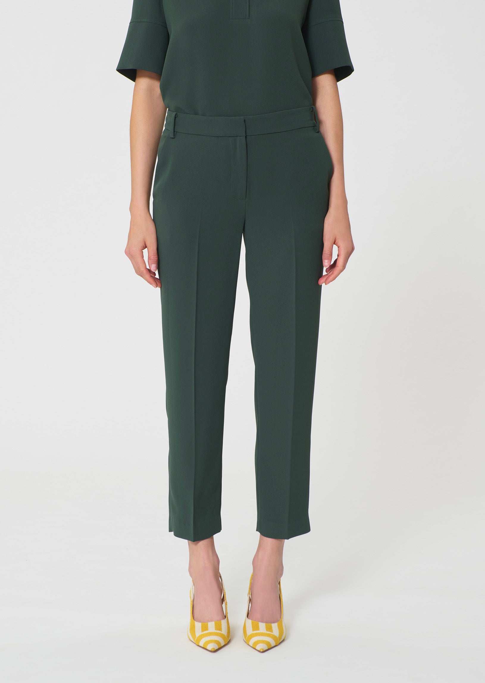 trousers in dark green in fluid crepe