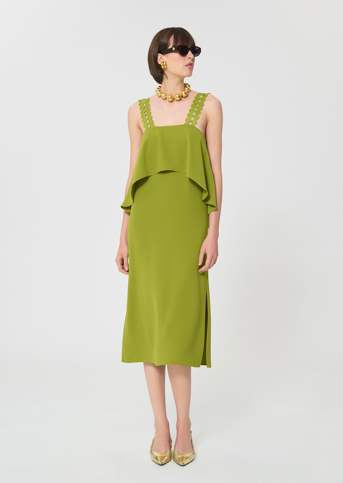 dress in green fluid crepe