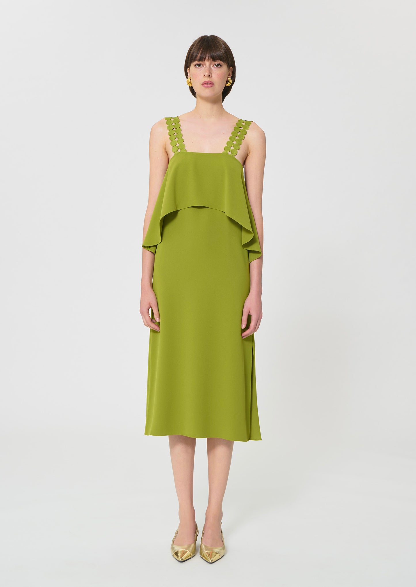 dress in green fluid crepe